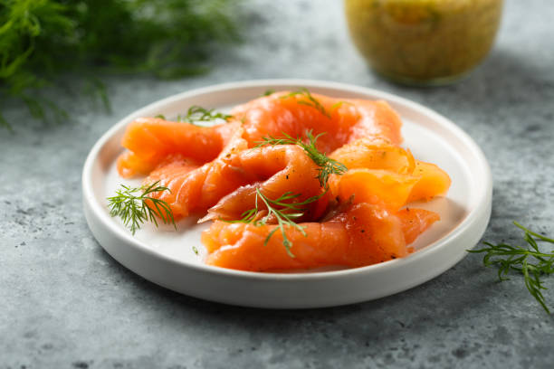 Smoked salmon Smoked salmon with dill and mustard sauce smoked salmon stock pictures, royalty-free photos & images