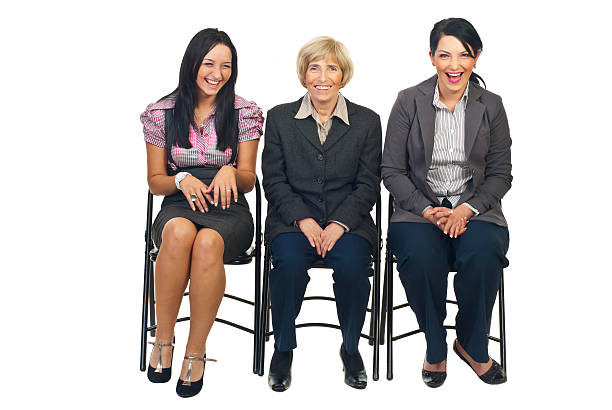 istock Laughing three business women on chair 119961935