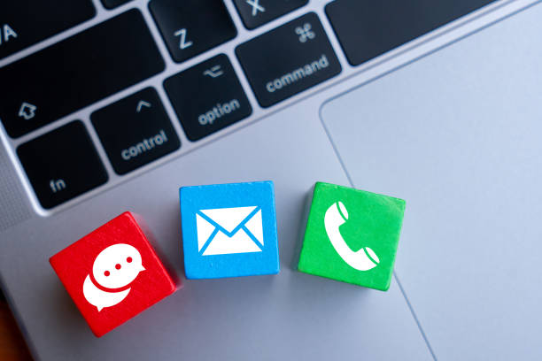 istock Contact us icon on colorful puzzle with hand 1199620795
