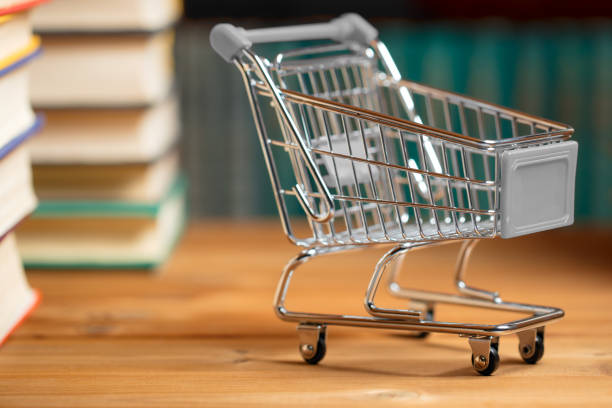 istock Books and a shopping cart 1199620800