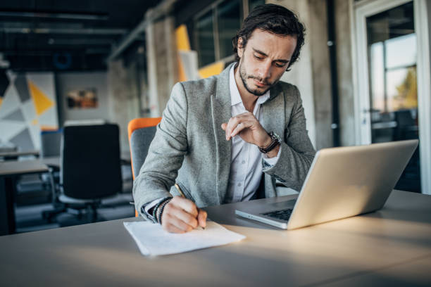 istock Businessman working in the office 1199621019