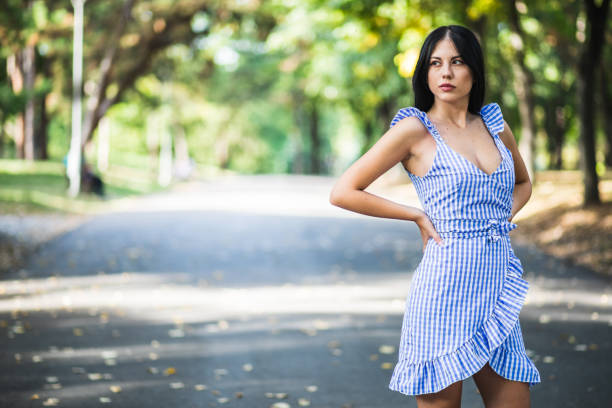 istock Attractive woman in park 1199626875