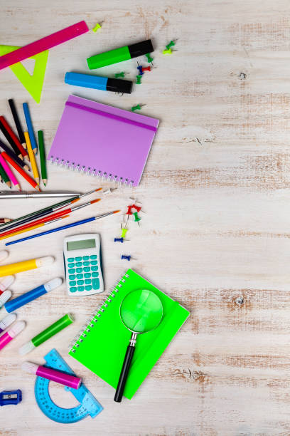 istock Items for the school on a wooden table. 1199629334