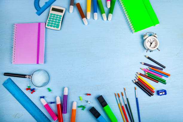istock Items for the school on a wooden table. 1199629902