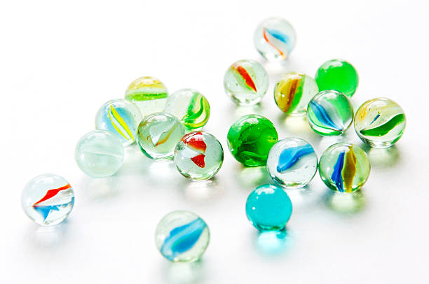 istock Glass marbles isolated against a white background. 119963135