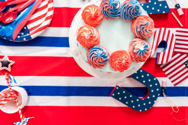 istock Red, white, and blue round vanilla cake with buttercream frosting 1199634432