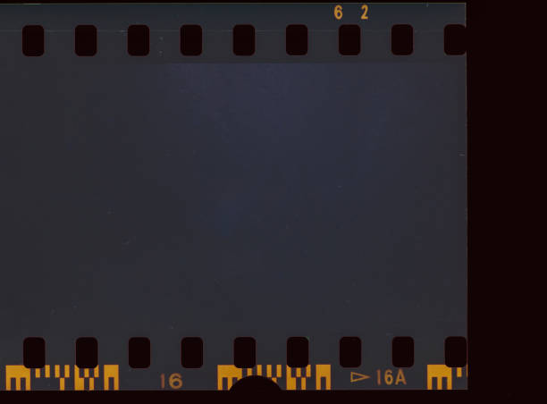 istock Abstract film texture background with heavy grain, dust and light leak 1199634573