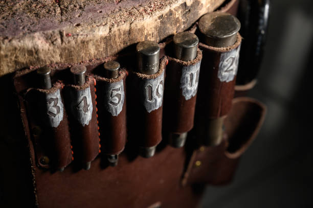 istock Set of leather craft tools on wooden background. Workplace for shoemaker. 1199640273