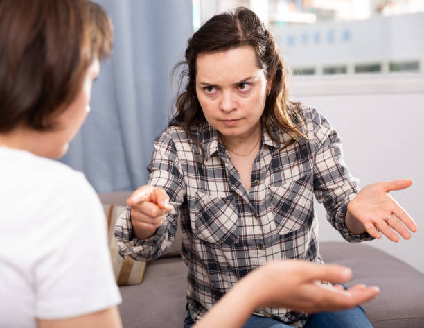istock Two unhappy woman having conflict at home 1199640411