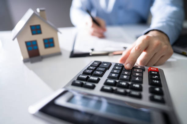 istock Businessman's Hand Calculating Invoice 1199640874