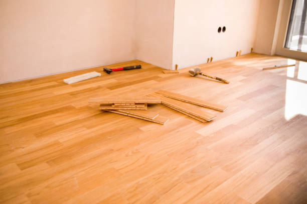 installation of a new wooden floor in a new apartment - tape measure home improvement measuring wood imagens e fotografias de stock