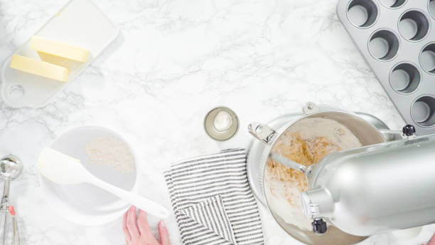 istock Mixing ingredients in kitchen mixer to bake mermaid theme vanilla cupcakes. 1199641958