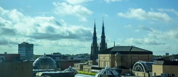 Eindhoven, Netherlands. A panoramic view from above. Rooftops of the city under a Holland cloudy sky.
