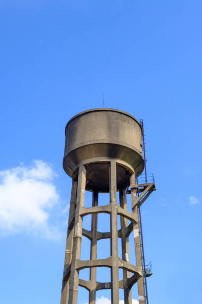 istock Old Water Tank Tower in the blue sky view 1199643522