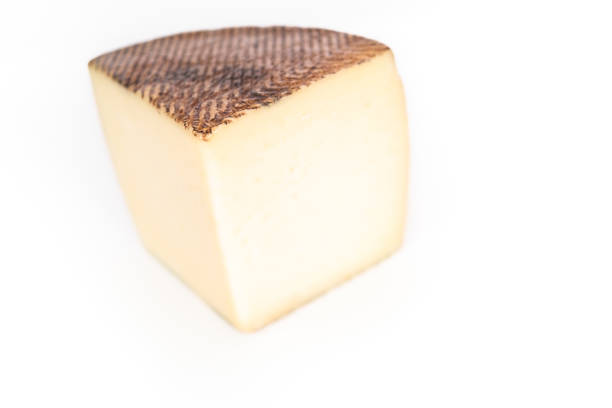 istock Large slice of aged Manchego cheese on a white background. 1199644760