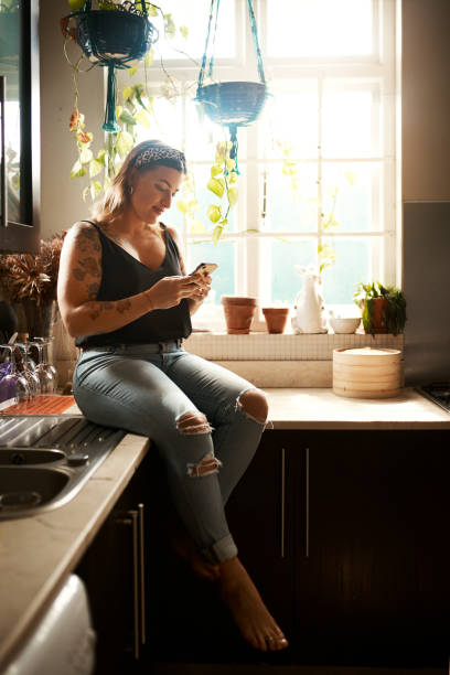 istock Whatever she needs her smartphone's got her covered 1199646941