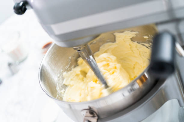 istock Making buttercream frosting for decorating a vanilla cake. 1199647068
