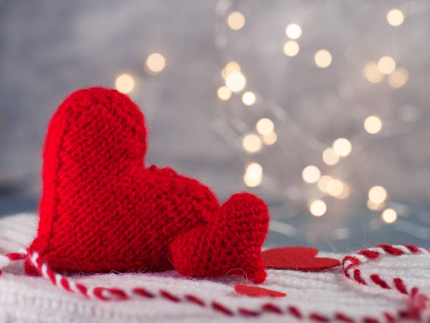 istock Red soft heart close up bokeh garland background 1199647170