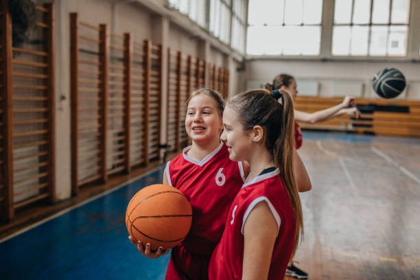istock Female School Basketball Team 1199647559