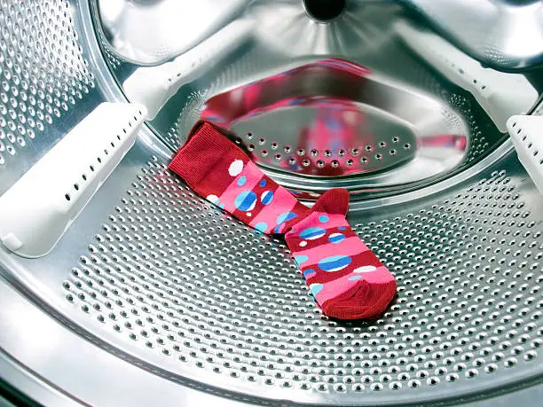 Do not forget the red or colorful  sock in a washing machine!