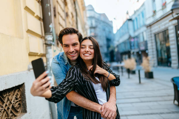 istock Happy couple enjoying in selfie 1199651278