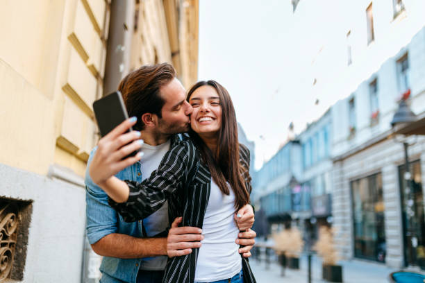 istock Happy couple enjoying in selfie 1199651428