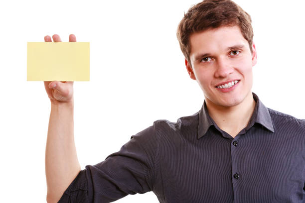 istock Young man with piece of paper. 1199652914