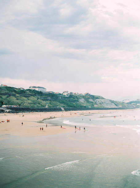 Surfers exiting the water in Biarritz France