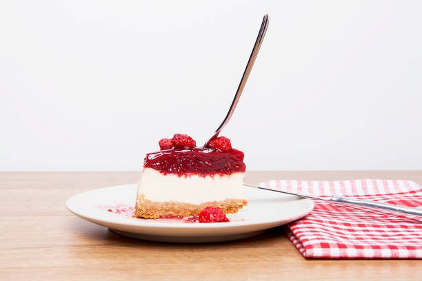 Raspberry Cheesecake on a plate.