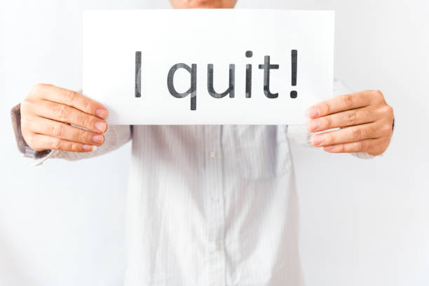istock Studio shot Asian male hand showing paper with I Quit  text concept 1199655197