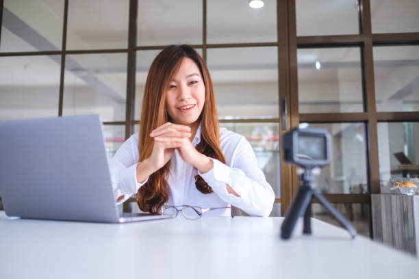istock a woman blogger or vlogger recording a video 1199656539