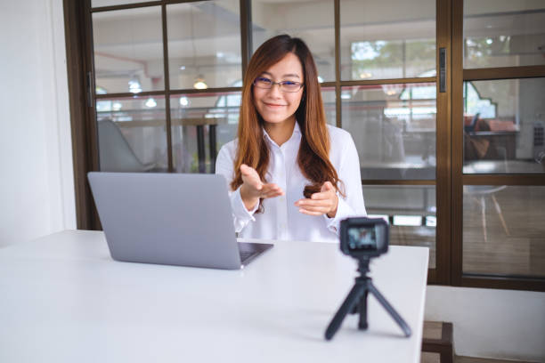 istock a woman blogger or vlogger recording a video 1199656590