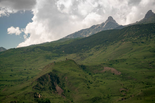 istock Natural landscape. The mountains and forest under a cloudy sky 1199656876