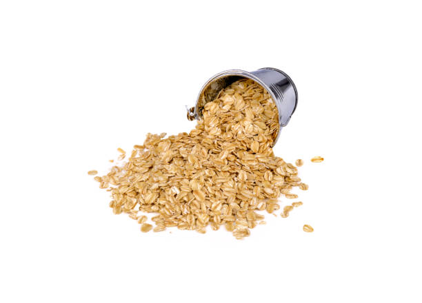 istock oatmeal in zinc bin and on white background 1199658760