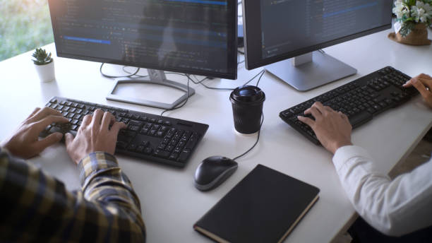 istock Cropped Hands Of People Working On Table 1199663547