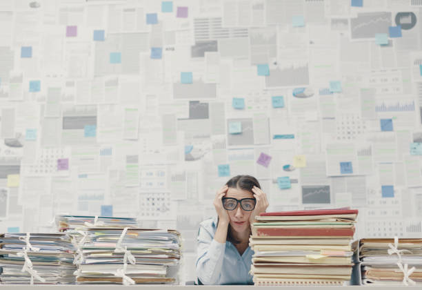 istock Stressed businesswoman overloaded with work 1199665151
