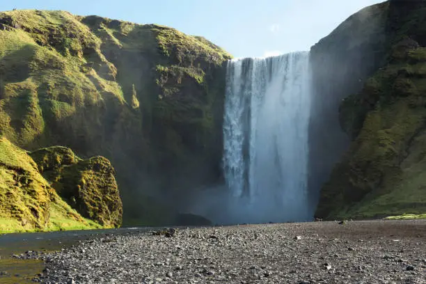 Skogafoss waterfall, on the Ring Road in Southern Iceland, is one of country's most epic tourist destinations