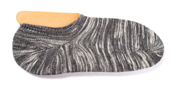 istock grey socks for men on a white background 1199666877