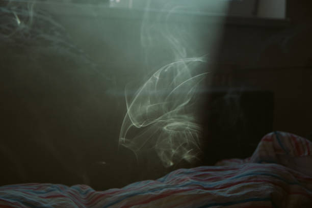 istock Smoking In The Bedroom 1199667148