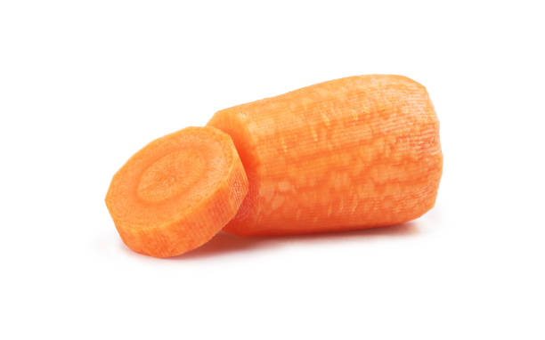 istock fresh carrots on a white background. 1199667924