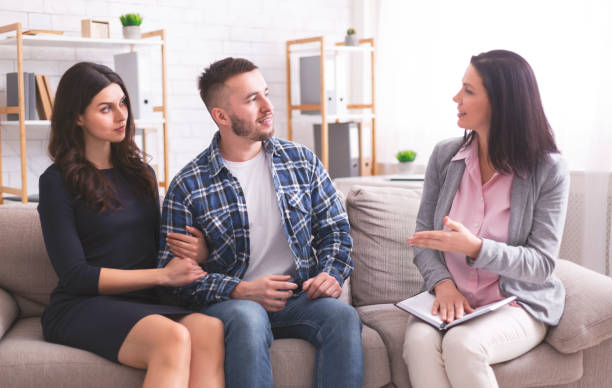 istock Millennial spouses talking with psychotherapist at office 1199670284