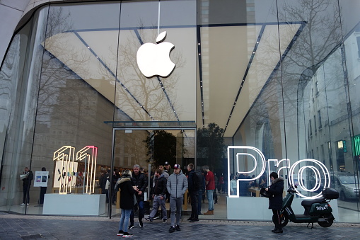 Basel, Switzerland - December 29, 2022: Apple Store entrance and logo.