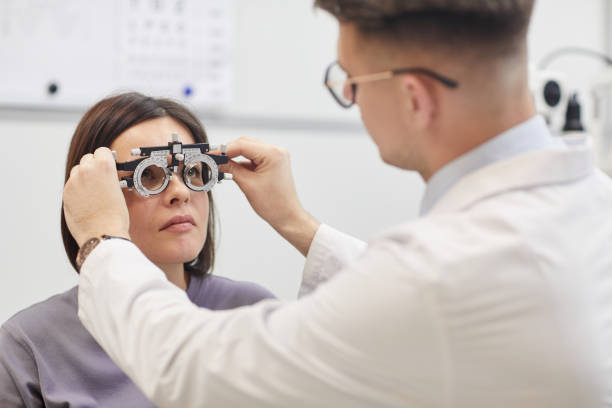 istock Glasses Fitting at Ophthalmologist Office 1199676255