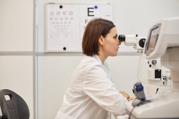 istock Female Ophthalmologist Using Vision Test Equipment 1199676530