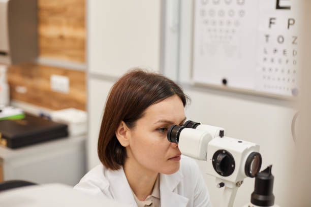 istock Female Ophthalmologist Using Eye Test Equipment 1199676556