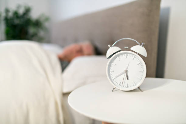 istock A Senior woman having sleep disorder, lying in bed 1199677094