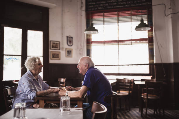 istock Senior couple in a cafe 1199679644