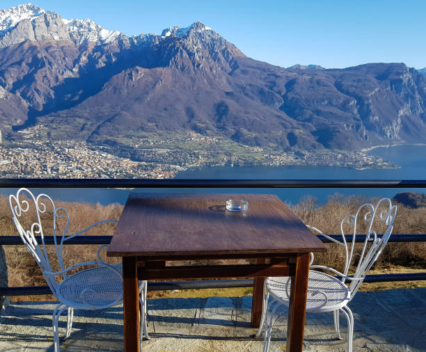 istock Chairs and table above lake Como and Grigne mountains 1199680011