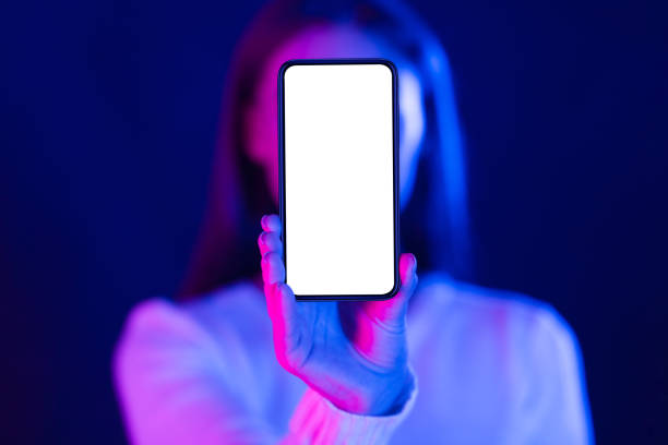 istock Mockup. Woman showing blank smartphone screen, closeup 1199680061
