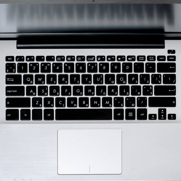 istock Minimal Freelancer workplace concept top view. Open laptop 1199680204